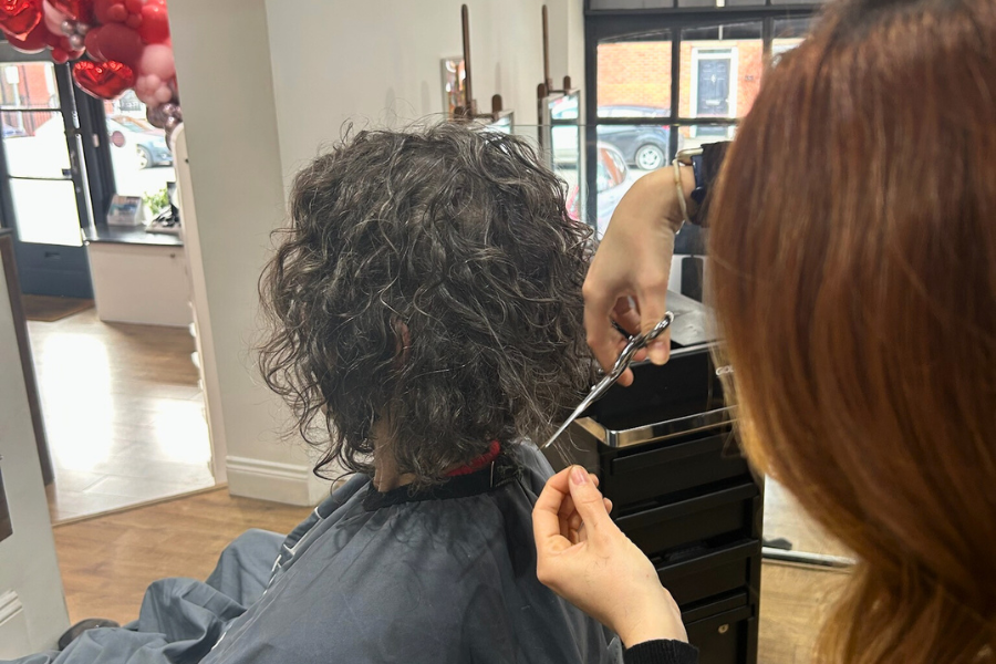 Curl-by-curl cutting at Time Hair & Beauty, Caterham, creating perfectly defined curls by individually shaping each curl for a flawless look.